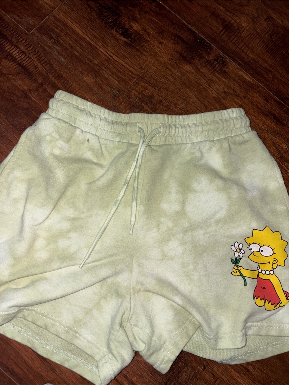 Women's Yellow Tie-Dye Athletic Shorts with Lisa Simpson Graphic
